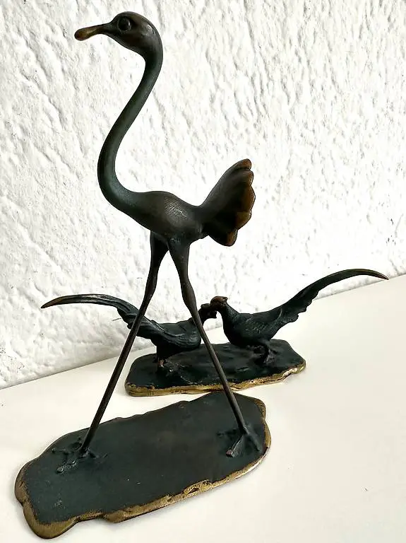 Statuine di bronzo patinato