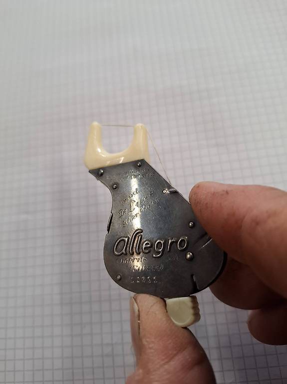 Antiker Zahnseidenspender