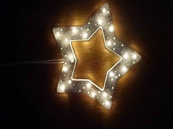Stern Dekoration beleuchtet glitzerweiss
